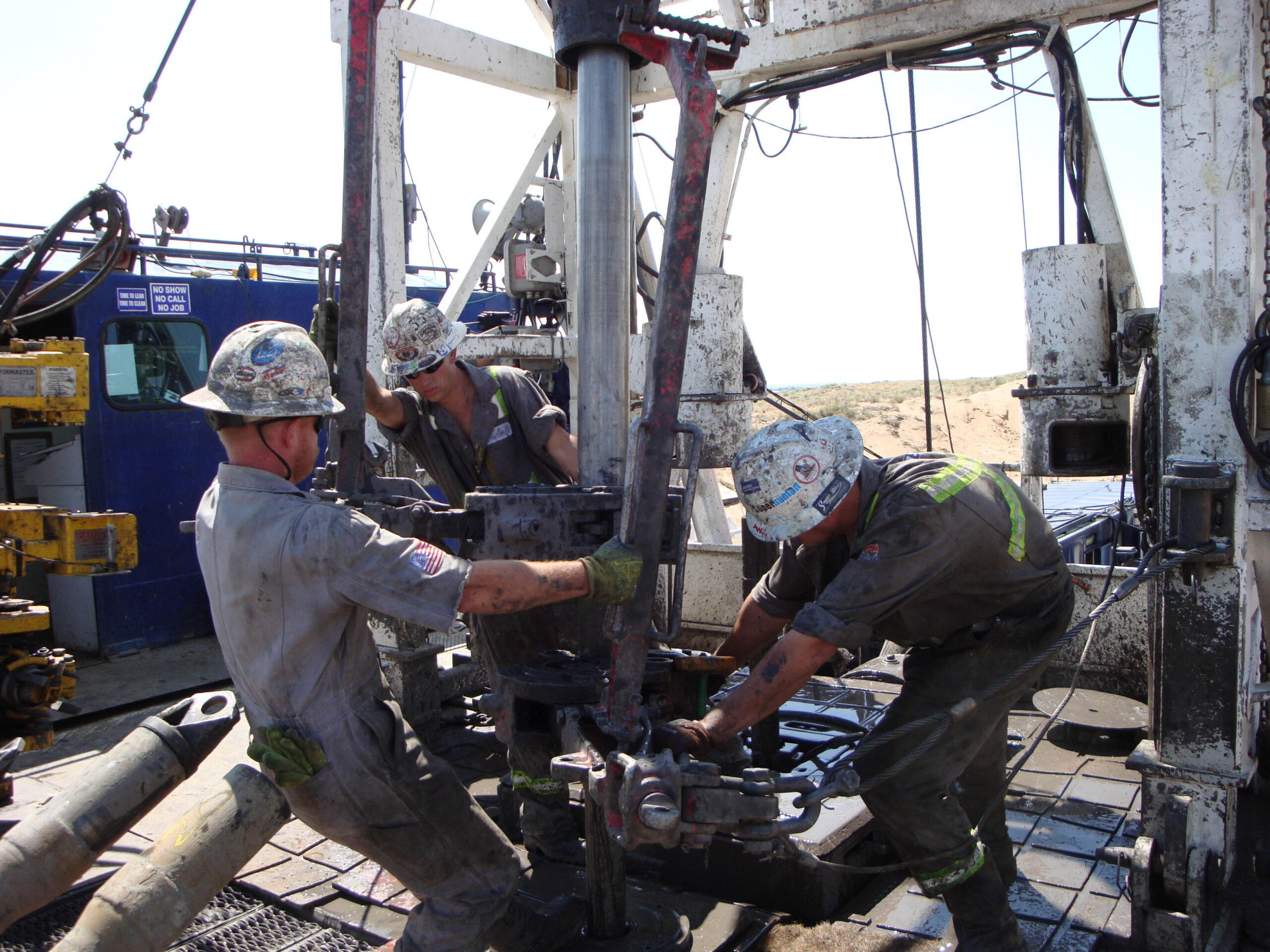 Oil well drilling roughnecks