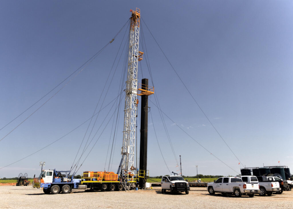 An oil drilling rig at a well site