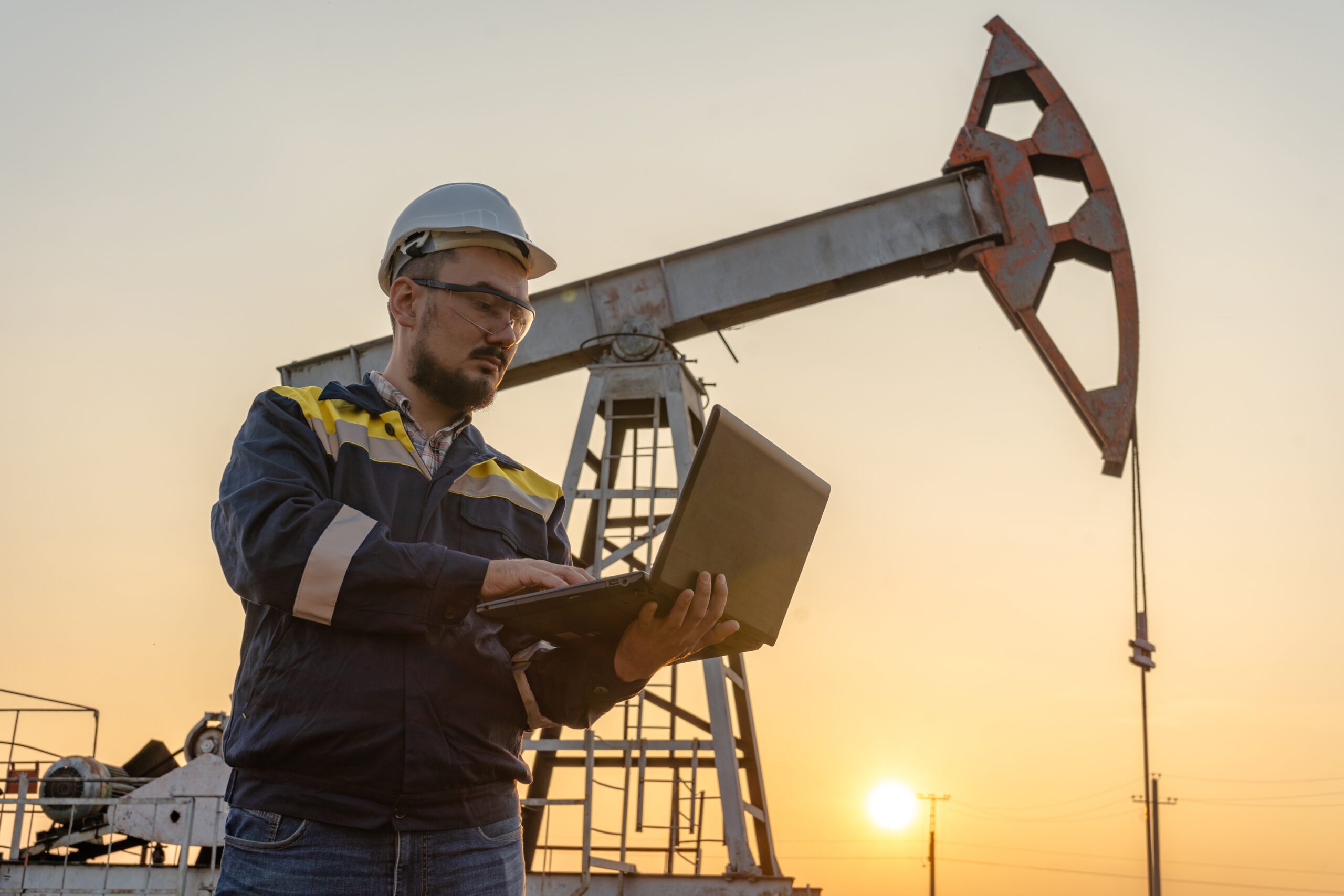 Petroleum engineer with a laptop